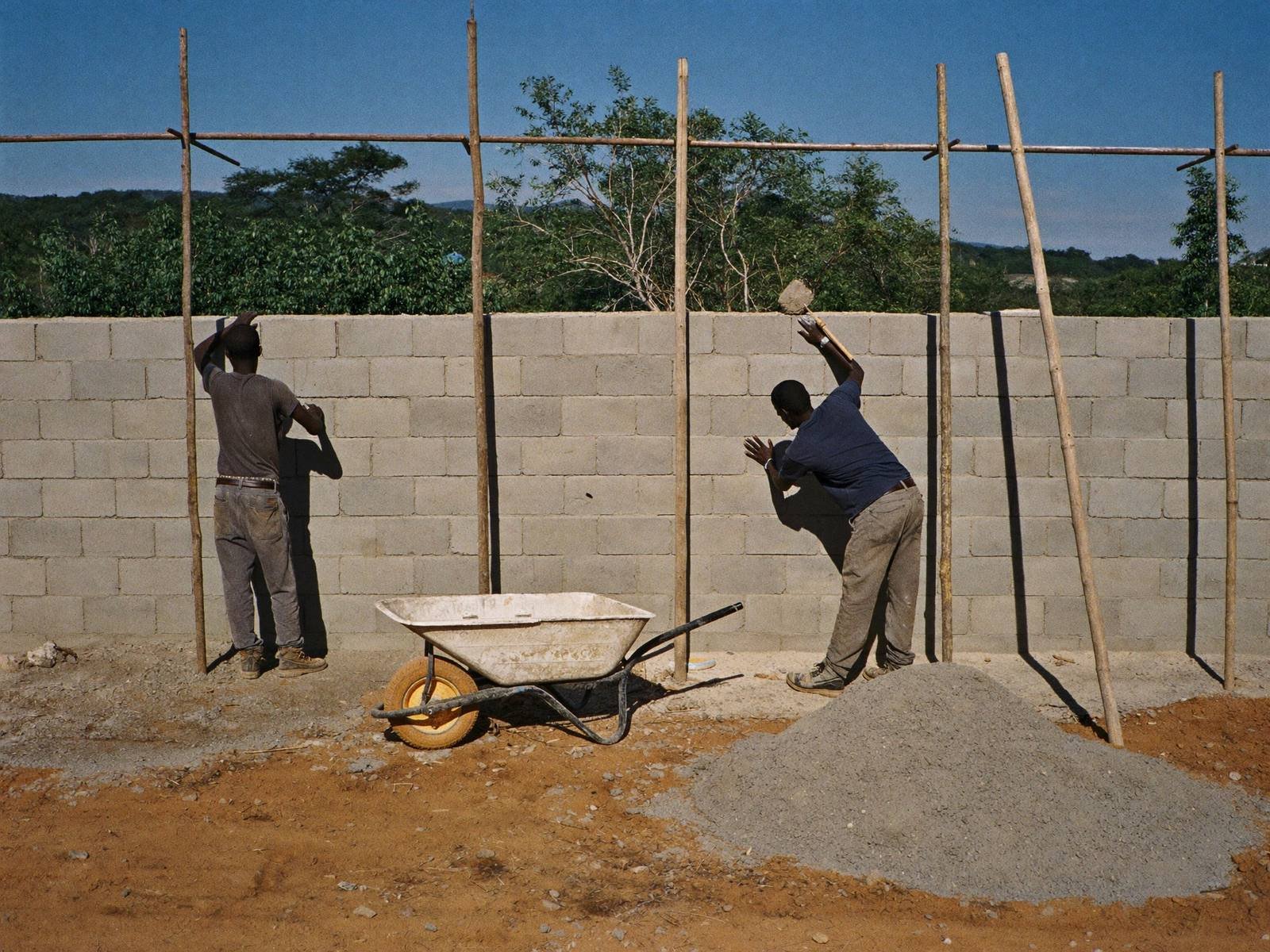 Masons building a classroom block